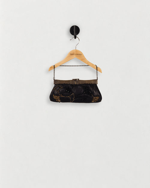 Leather Hand-Beaded Handbag — front view on an ERICA REED hanger